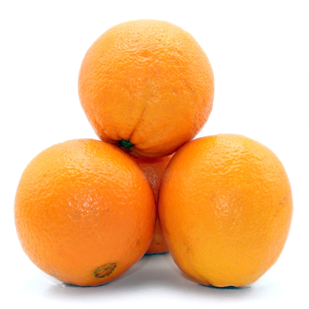 Fresh Algarve oranges stacked in a pyramid shape, showcasing their vibrant color and natural texture. Sweet, juicy, and chemical-free citrus fruits.