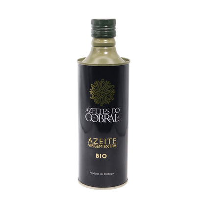 A bottle of Azetites do Cobral Azeite Virgem Extra Bio olive oil, featuring a black label with gold and white lettering and a dark green cap, set against a plain white background.