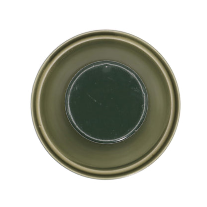 An overhead view of a round olive green container or lid with a darker green circular insert, shown on a plain white background.