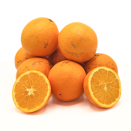 Stack of oranges with one cut in half on a white background