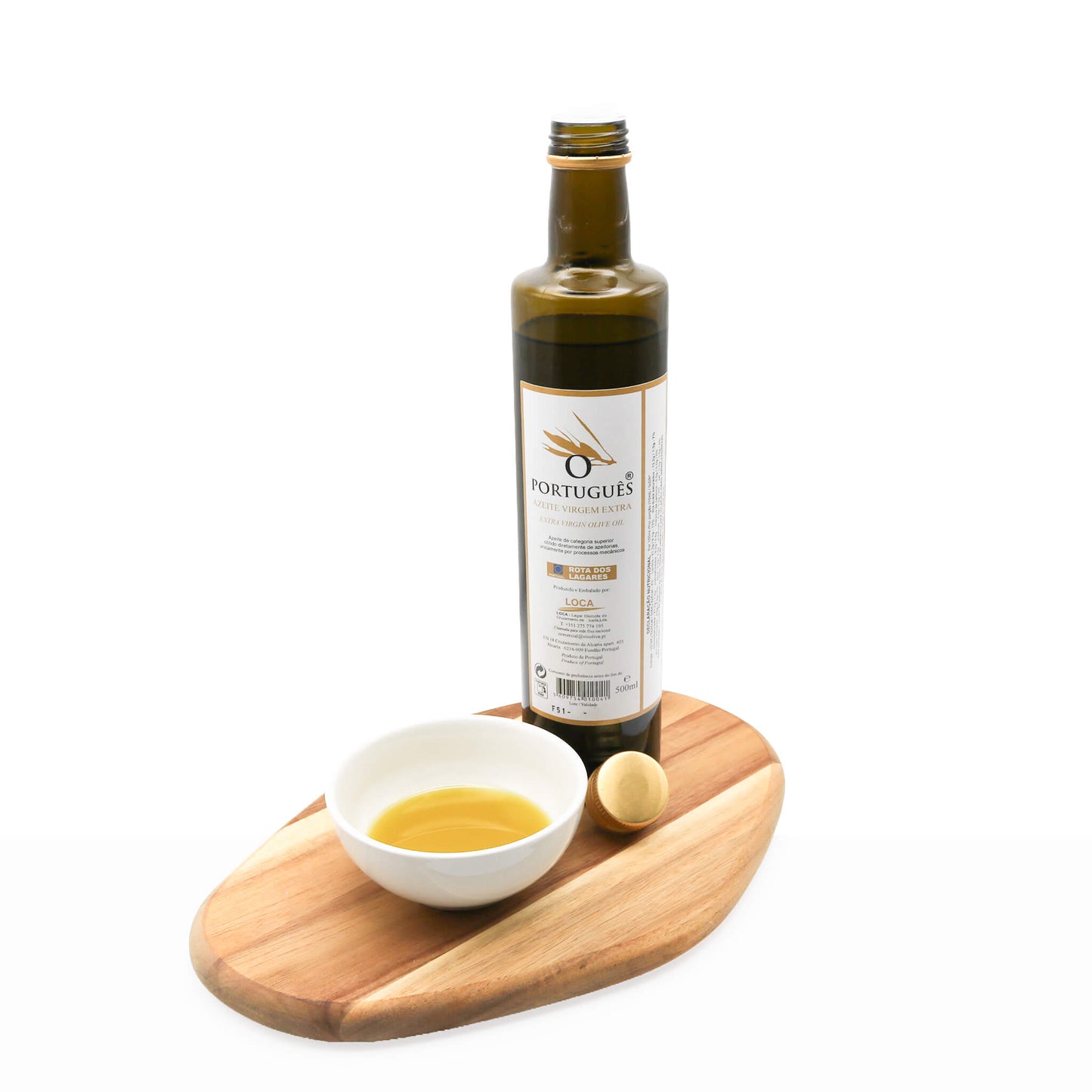 Bottle of olive oil with a wooden board and small bowl on a white background